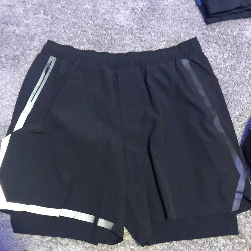 Dark gray lululemon special edition surge shorts
